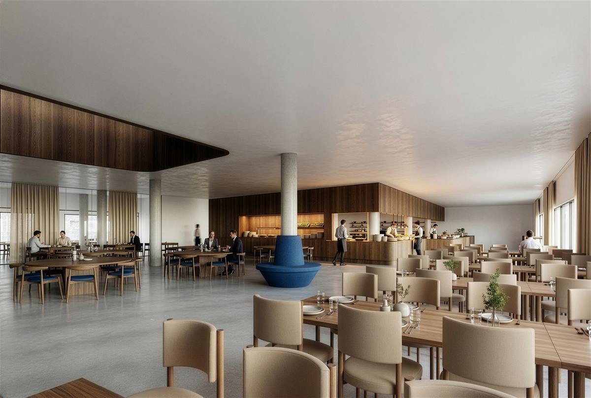 Kantine og spiseområde med trælofts-detalje og åbent køkken